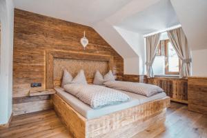 Postel nebo postele na pokoji v ubytování Gasthof Geraerhof