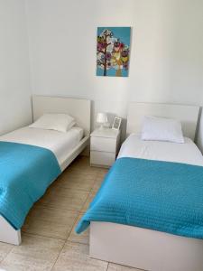 Łóżko lub łóżka w pokoju w obiekcie Casa Josephine Lanzarote, spectacular sea views & FREE WiFi