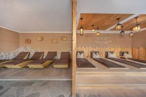 Postel nebo postele na pokoji v ubytování Hotel Chalet Dlaces