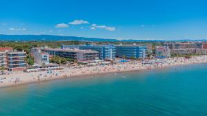 an aerial view of a beach with people on it at Apartamentos Turísticos Augustus in Cambrils +112 photos