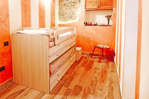 Postel nebo postele na pokoji v ubytování Casa Laura, Fosdinovo - Stile e Relax a 5 stelle