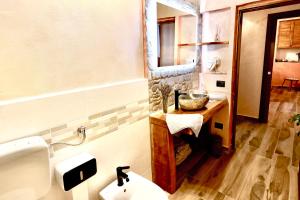 Postel nebo postele na pokoji v ubytování Casa Laura, Fosdinovo - Stile e Relax a 5 stelle