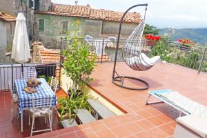 Balkón nebo terasa v ubytování Casa Laura, Fosdinovo - Stile e Relax a 5 stelle