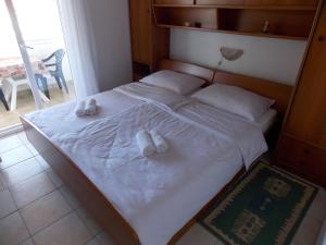 Postel nebo postele na pokoji v ubytování Barbat 730