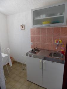 Kuchyň nebo kuchyňský kout v ubytování Barbat 730