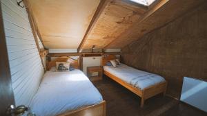 Postel nebo postele na pokoji v ubytování Hostal Climb House