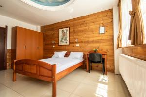Uma cama ou camas num quarto em Hotel Enigma