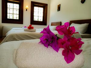Postel nebo postele na pokoji v ubytování Guest Mansion, Гостински Палат