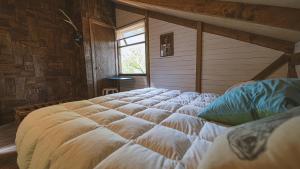 Postel nebo postele na pokoji v ubytování Hostal Climb House