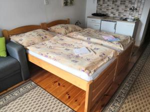 Posteľ alebo postele v izbe v ubytovaní Apartmány v centru u Moravců
