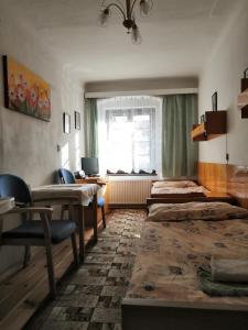 Posteľ alebo postele v izbe v ubytovaní Apartmány v centru u Moravců