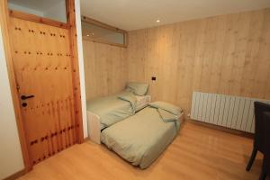 Posteľ alebo postele v izbe v ubytovaní Anemone Home