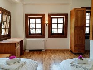 Postel nebo postele na pokoji v ubytování Guest Mansion, Гостински Палат