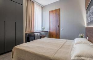 Postel nebo postele na pokoji v ubytování Hotel History • სასტუმრო ისტორია
