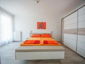 Postel nebo postele na pokoji v ubytování Ferienwohnung Lexe