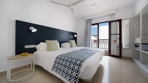Broncemar Beach Suites客房内的一张或多张床位