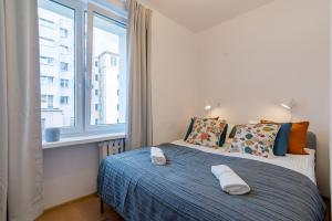 Krevet ili kreveti u jedinici u objektu Gdynia Sleeps Apartment