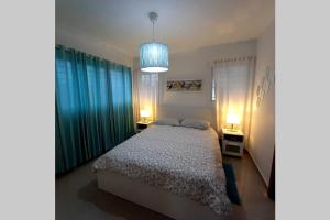 Postel nebo postele na pokoji v ubytování Confortable apartamento de 3 tres habitaciones, con hermosa vista de area verde, ademas de piscinas y juegos infantiles en area recreativa + 24 fotografií