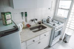 Η κουζίνα ή μικρή κουζίνα στο Falucho +7 φωτογραφίες