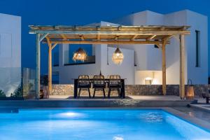 Photo de la galerie de l'établissement Grand Blue Villas Lachania, à Lakhania 39 autres photos