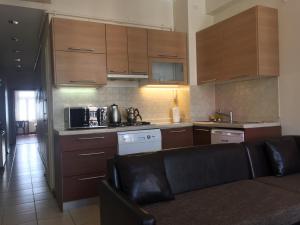 A kitchen or kitchenette at Taksim House Suites