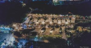 an overhead view of a building with tables and umbrellas at Hotel Costa Diva in Praiano