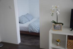 Postel nebo postele na pokoji v ubytování Feel Danube apartment