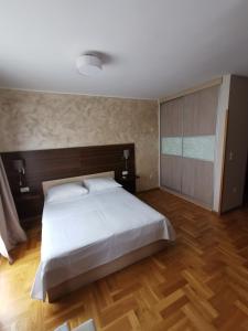 Postel nebo postele na pokoji v ubytování Villa Salvia