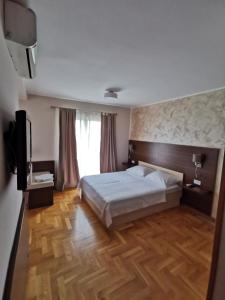 Postel nebo postele na pokoji v ubytování Villa Salvia