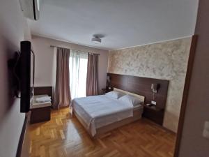 Postel nebo postele na pokoji v ubytování Villa Salvia