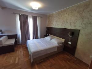 Postel nebo postele na pokoji v ubytování Villa Salvia