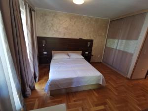 Postel nebo postele na pokoji v ubytování Villa Salvia