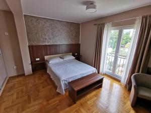 Postel nebo postele na pokoji v ubytování Villa Salvia