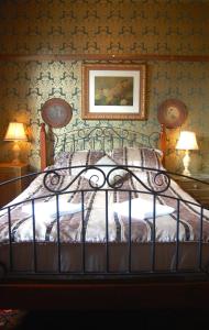 Ένα ή περισσότερα κρεβάτια σε δωμάτιο στο Shakespeare Hotel