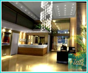 a lobby of a hair salon with a chandelier at Manaíra Apart Hotel - Flat 201 in João Pessoa