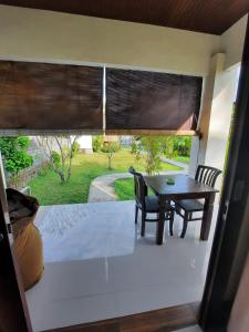 Balkón nebo terasa v ubytování Bumbung Bungalows + 25 fotografií