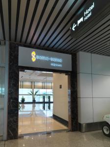 a sign for the santa fe center at an airport at Sama Sama Express KLIA (Airside Transit Hotel) in Sepang