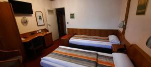 Postel nebo postele na pokoji v ubytování Miles Hotel Berlin