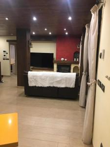 Postel nebo postele na pokoji v ubytování Hostal Mulhacen