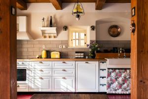 A kitchen or kitchenette at Domčok na Slnečnom Kopci