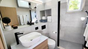 Koupelna v ubytování Harmony apartment Podstrana Split + 19 fotografií