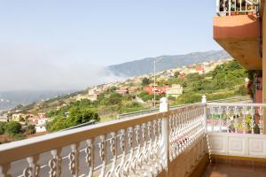 a balcony with a view of a city at Home2Book Charming Apartment Los Realejos in Los Realejos