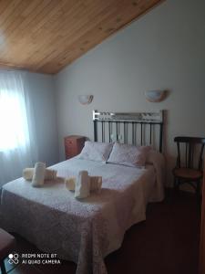 Ένα ή περισσότερα κρεβάτια σε δωμάτιο στο Casa Puerto