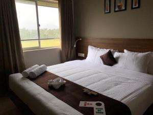 Postel nebo postele na pokoji v ubytování Hotel Mayo