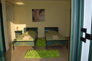 A bed or beds in a room at Villa Thetis with private pool where the sunsets fade away