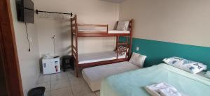 Poschodová posteľ alebo postele v izbe v ubytovaní Pedra do Sol Pousada