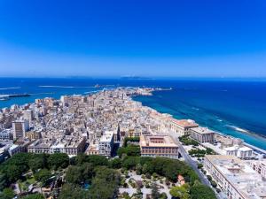 an aerial view of a city next to the ocean at Al Vicoletto in Trapani