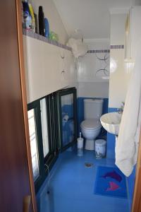 A bathroom at Villa Thetis with private pool where the sunsets fade away
