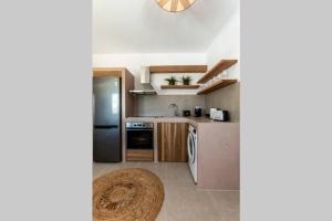 Una cocina o zona de cocina en Apleton Suites