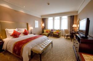 TV a/nebo společenská místnost v ubytování Shanghai Fenyang Garden Boutique Hotel